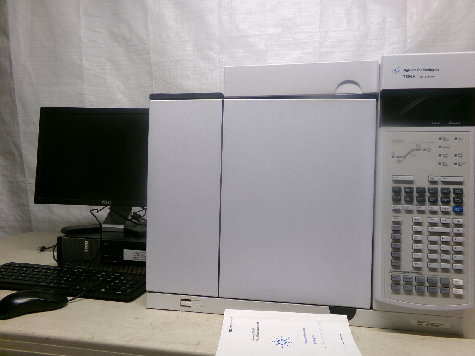 A computer and an Agilent Technologies GC System.