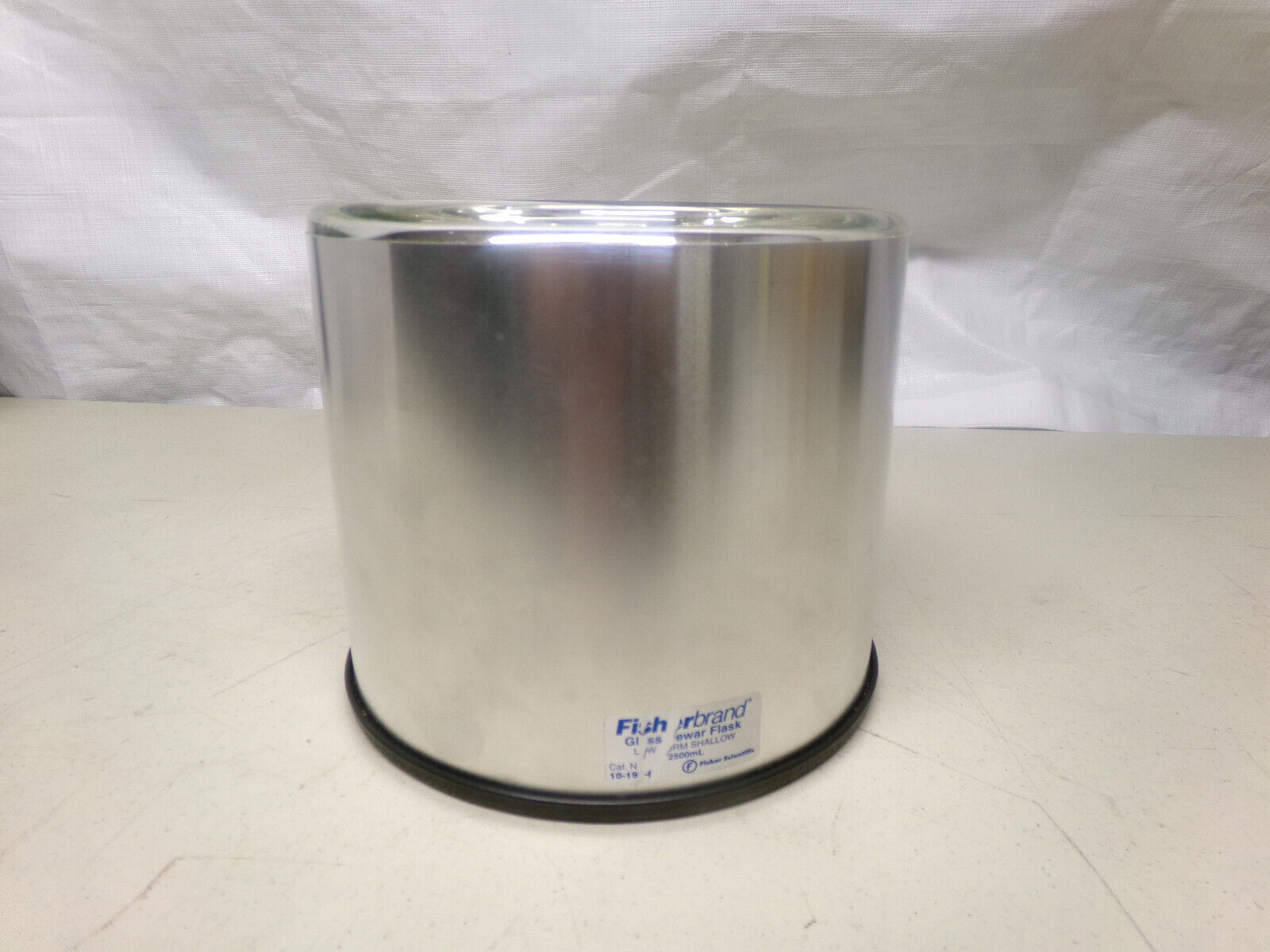 A glass beaker with a ground-glass rim.